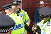 A National Front protestor is arrested during a demonstration in Finsbury Park, London. 